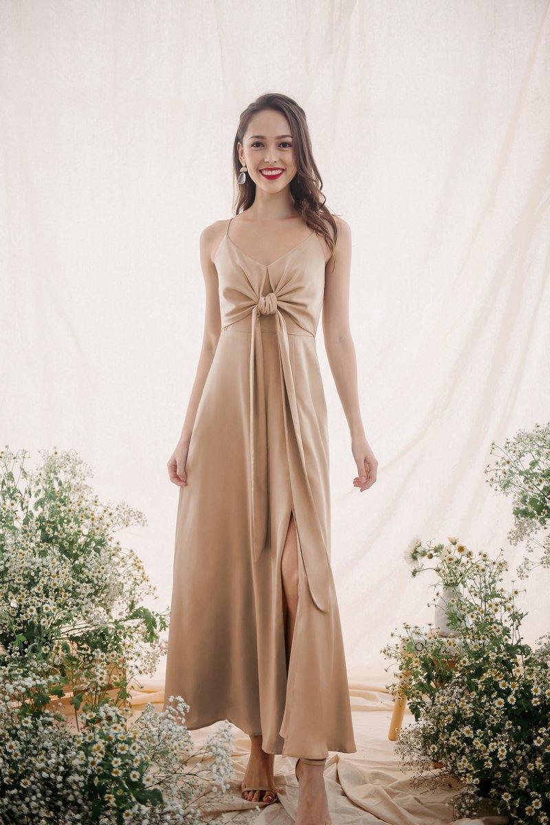 https://d18xait91bvnyr.cloudfront.net/sites/files/thethreadtheory/productimg/202111/800x1200/Ways-to-love-you-convertible-dress-Gold-1.jpg